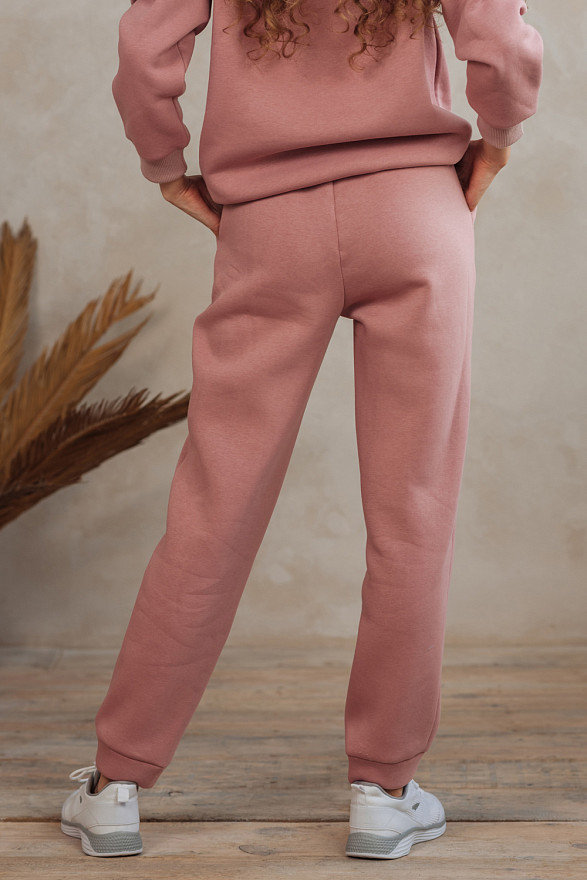 Пудрові спортивні штани з написом