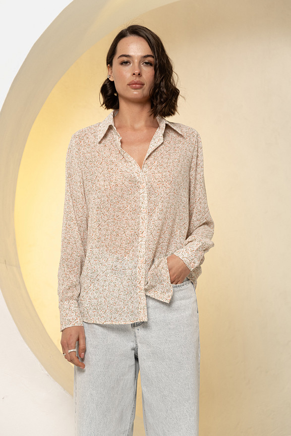 Кремова блуза вільного крою