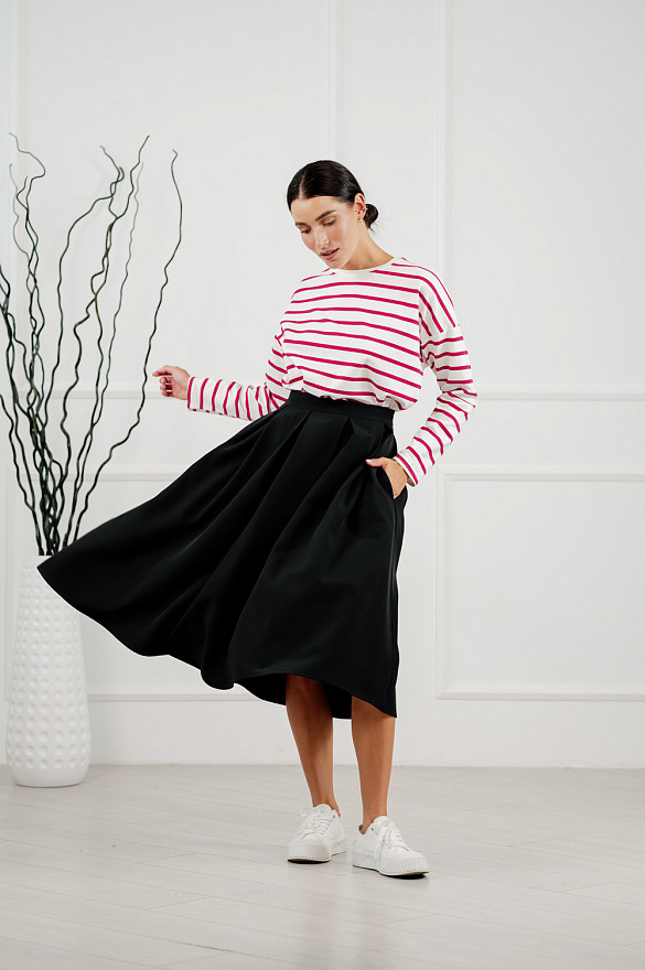 Black pleated below-the-knee skirt
