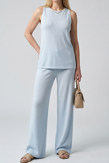 Minimalist knit set designed in a refined quiet luxury aesthetic. The relaxed tank top and wide-leg elastic-waist pants with pockets create an effortless elegant silhouette. Perfect for everyday wear, travel, and city styling. A versatile wardrobe staple for a modern minimal look.