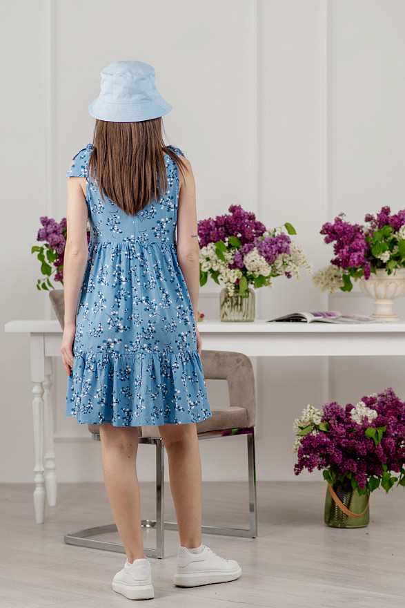 Light blue mini dress with bows on the shoulders