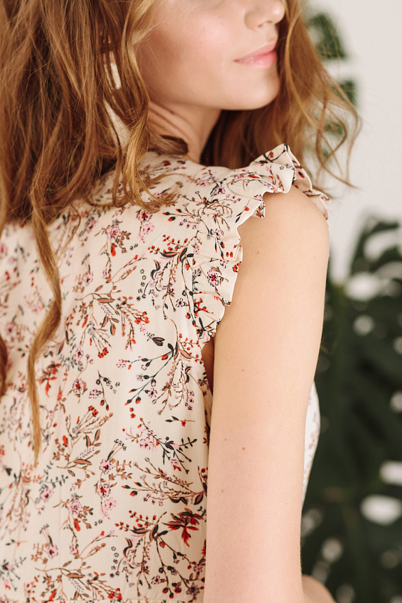 Long beige dress with ruffles