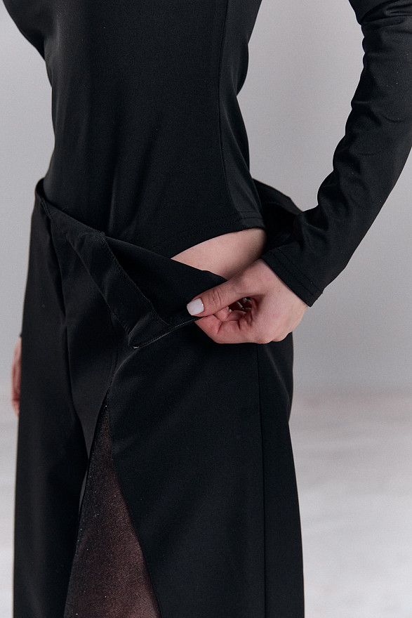 Black bodysuit with a shaped neckline made of mesh
