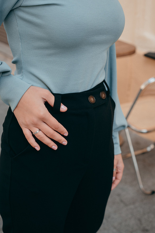 Black trousers with beveled waistband