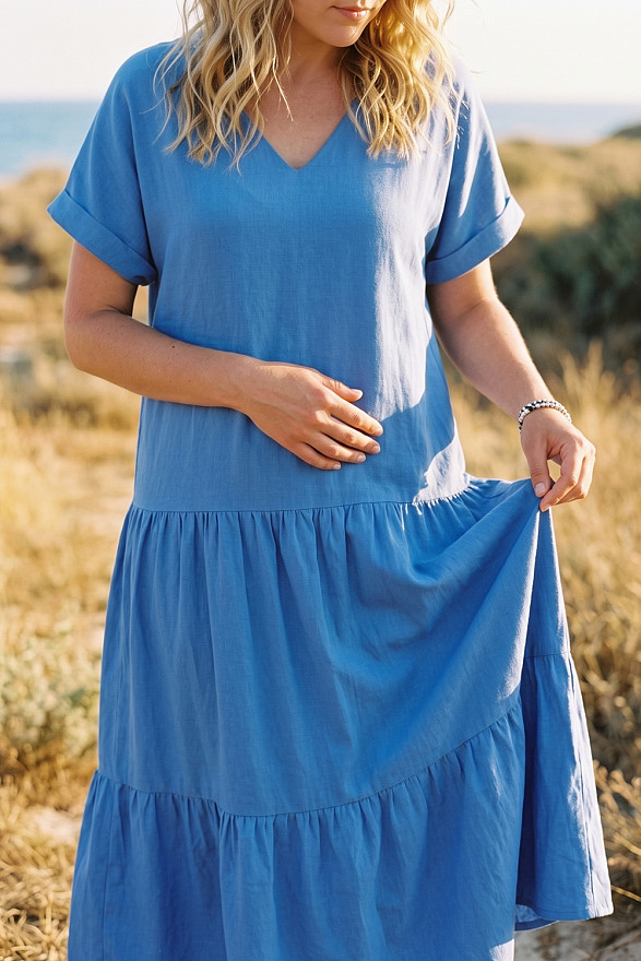 Light blue V-neck midi dress with wide ruffles