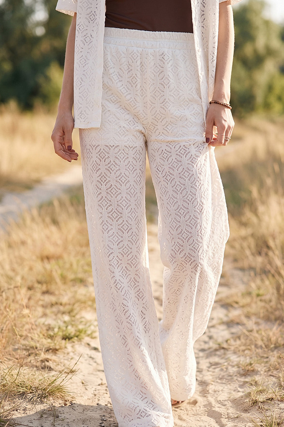 Milk-colored women's guipure suit