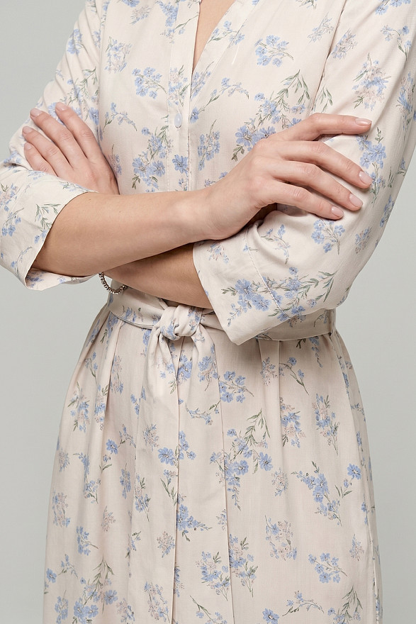Light blue loose-fitting shirt dress with a belt