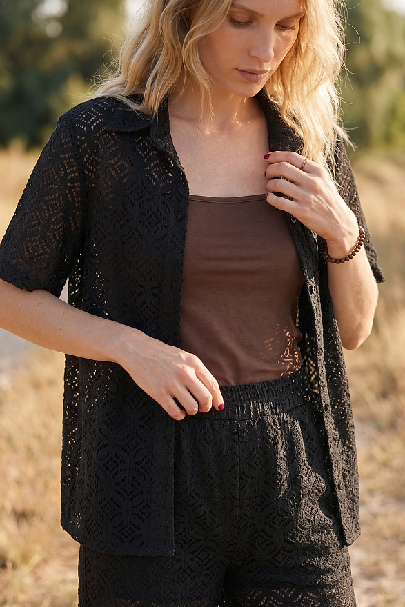 Black women's guipure suit