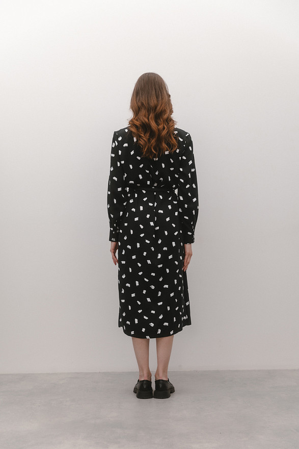 Black slip dress with slits at the side seams