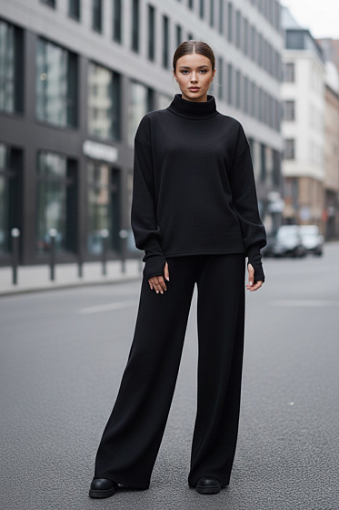 A cozy walking suit made of soft knitted angora. Its relaxed fit and long sweatshirt with an elegant stand-up collar provide a feeling of weightless warmth and freedom of movement, perfect for long autumn and winter days. Thoughtful details—pants with a soft elastic waistband and pockets and thumbhole cuffs—will ensure you'll forget about the cold and enjoy every moment in this stylish set.