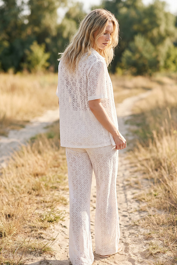 Milk-colored women's guipure suit
