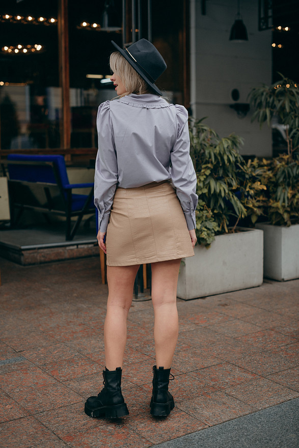 Mini skirt with pockets in eco leather python