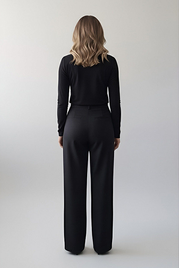 Черный лонгслив с воланами