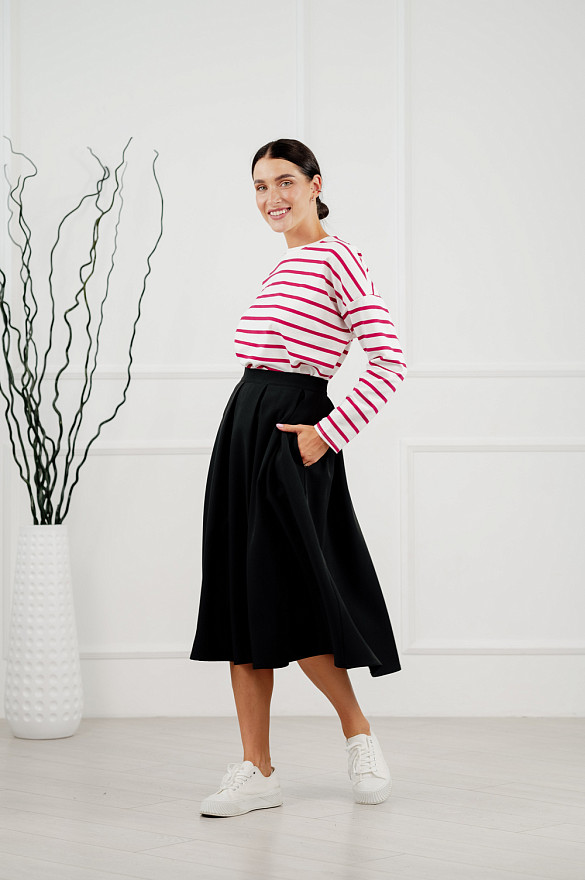Black pleated below-the-knee skirt