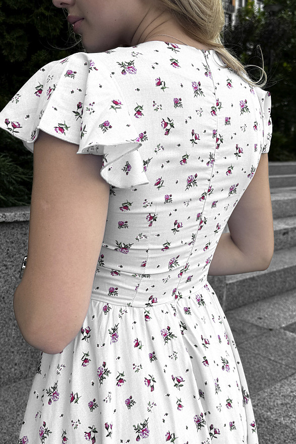 Молочна приталена сукня з рукавами-крильцями