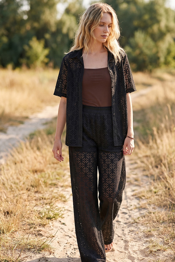 Black women's guipure suit