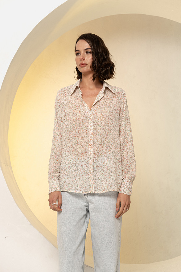 Кремова блуза вільного крою