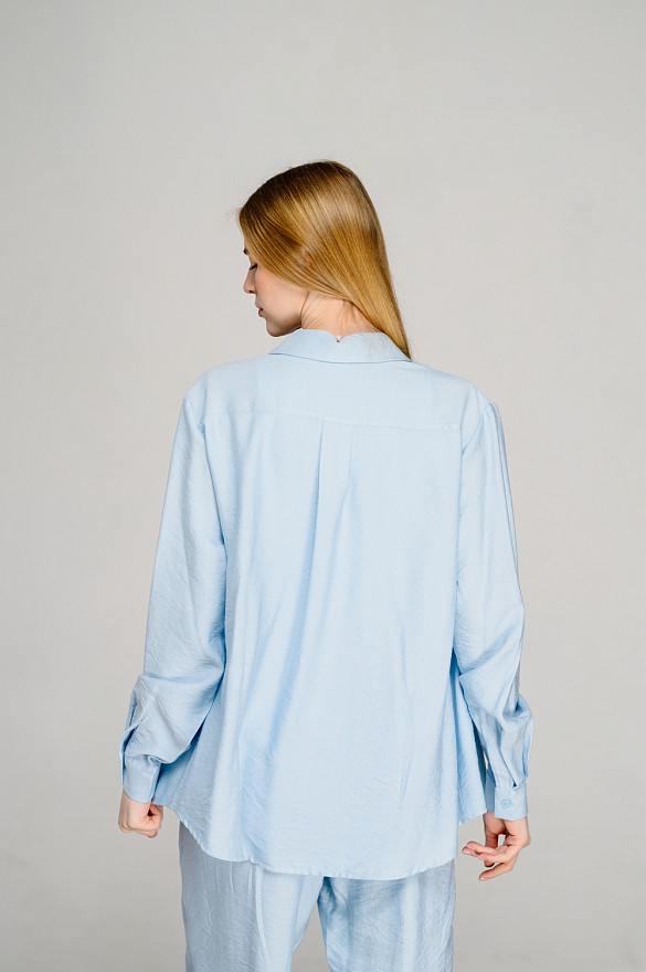 Блакитна сорочка вільного крою
