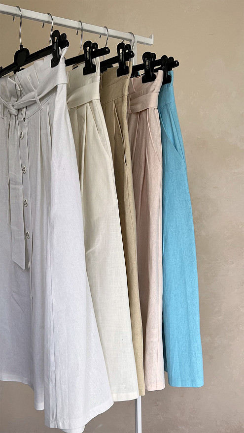 Блакитна спідниця із льону зі складками