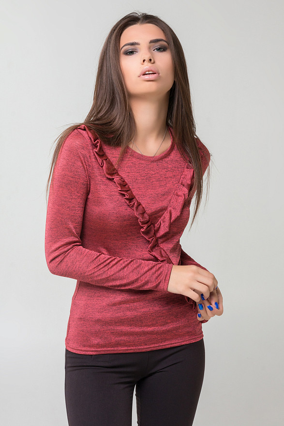 Turtleneck with ruffles.