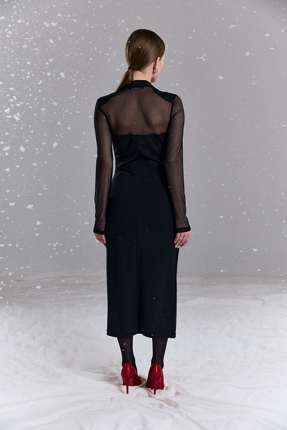 Black fitted dress with elegant mesh inserts