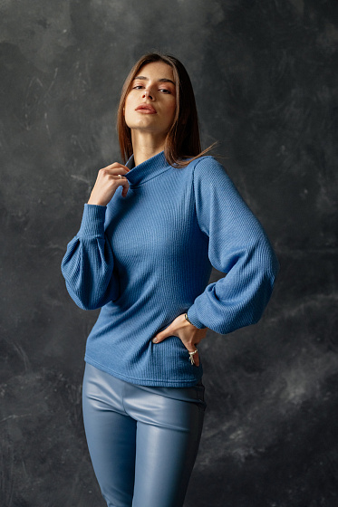 Soft jersey golf with a neckline and cuffed sleeves.