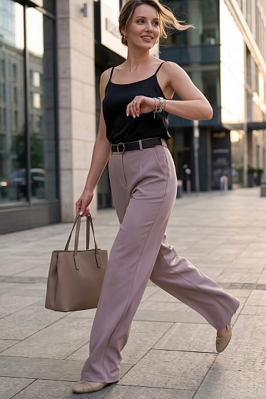 Classic straight-leg trousers with pressed creases are a versatile staple for an elegant wardrobe. The sharp crease lines visually elongate the silhouette, while the clean design fits seamlessly into both office and casual outfits. Side pockets, a zip fly, and an elasticated back insert ensure a neat fit.
