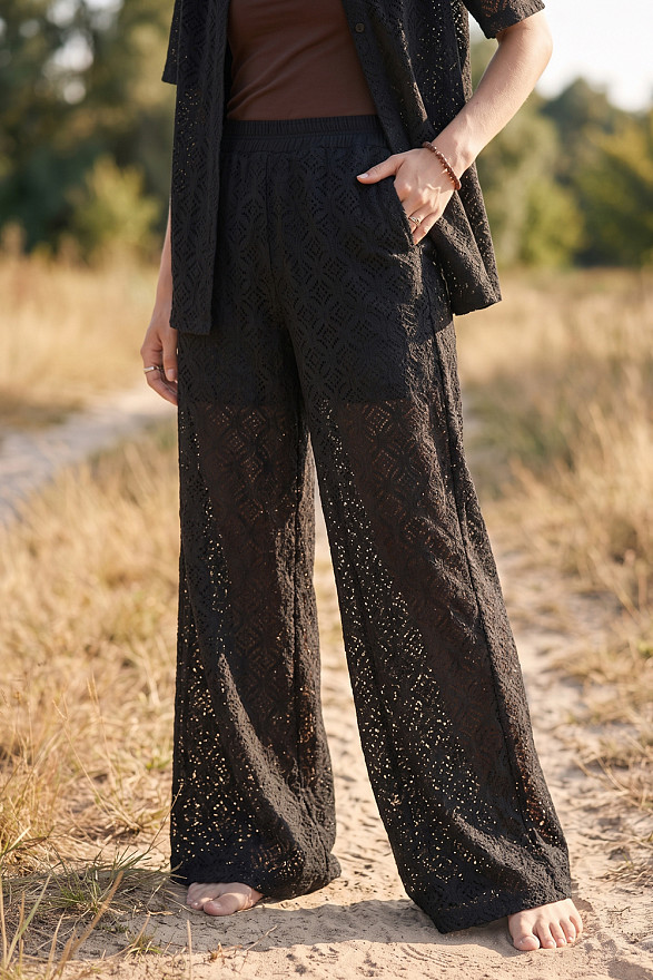 Black women's guipure suit