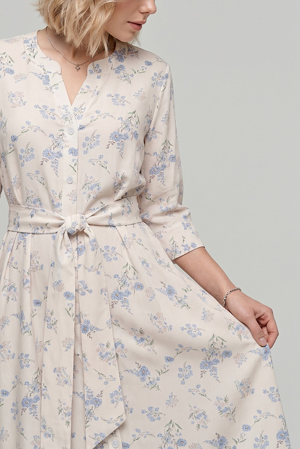 Light blue loose-fitting shirt dress with a belt