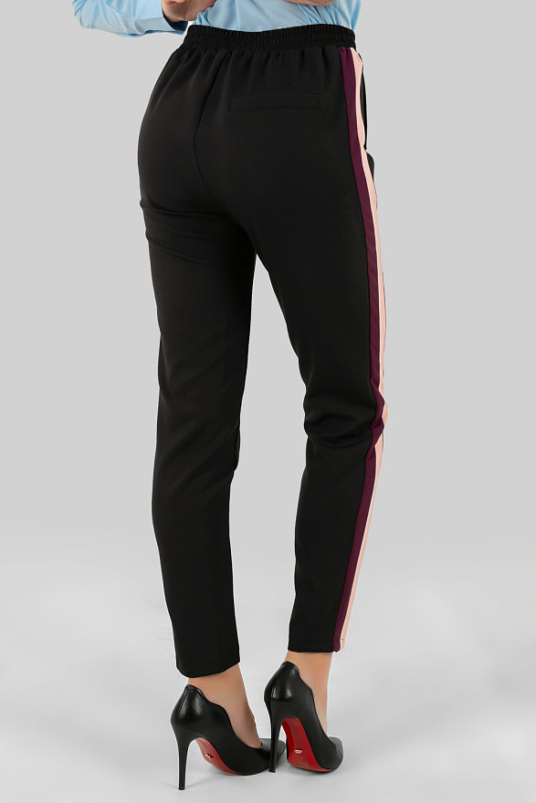 Trousers with two-tone stripes