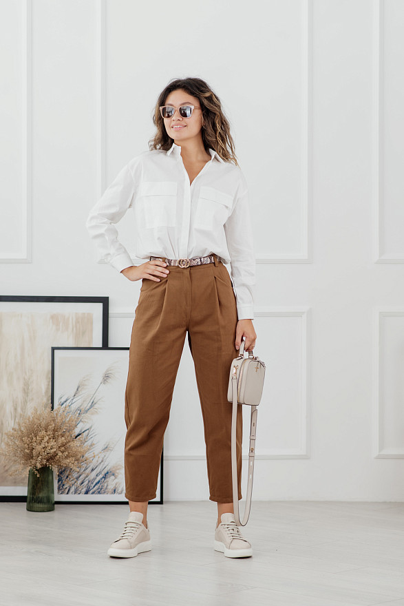 Карамельні джинси з кишенями і складками