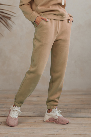 Sweatpants, elasticated waistline, side pockets. Warm and cozy fabric is suitable for winter.¶The fabric is safe for health and has the international quality standard OEKO Tex 100