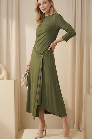 Elegant fitted midi dress in soft knit fabric with 3/4 sleeves — the perfect blend of comfort and femininity. Built-in stand collar, asymmetric draping and a slit with decorative button visually slim the silhouette. Ideal for office and events, wrinkle-resistant and flattering fit.