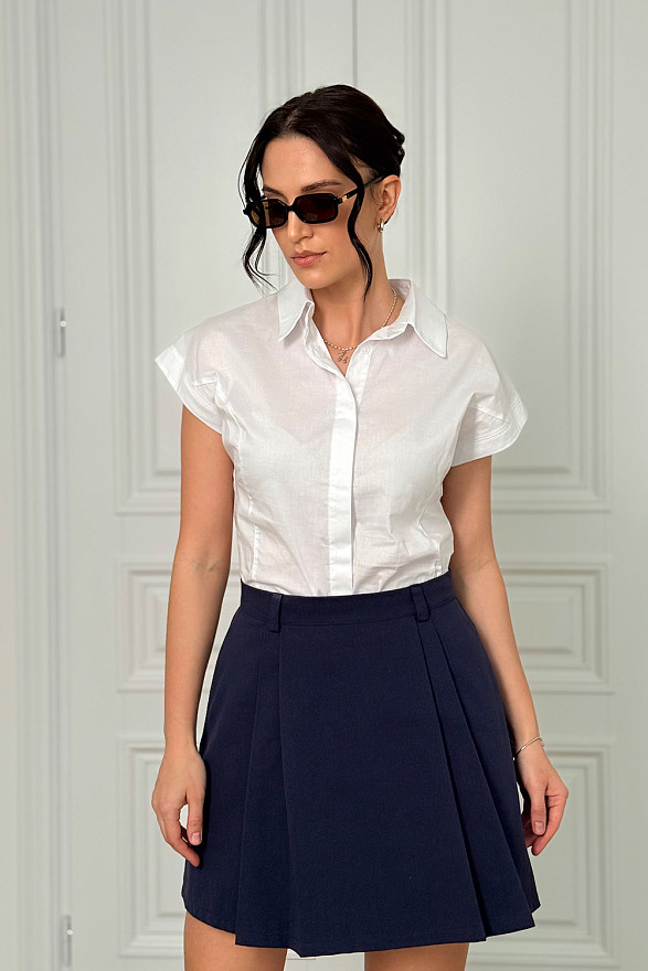 Синяя юбка-трапеция с элегантными складками спереди