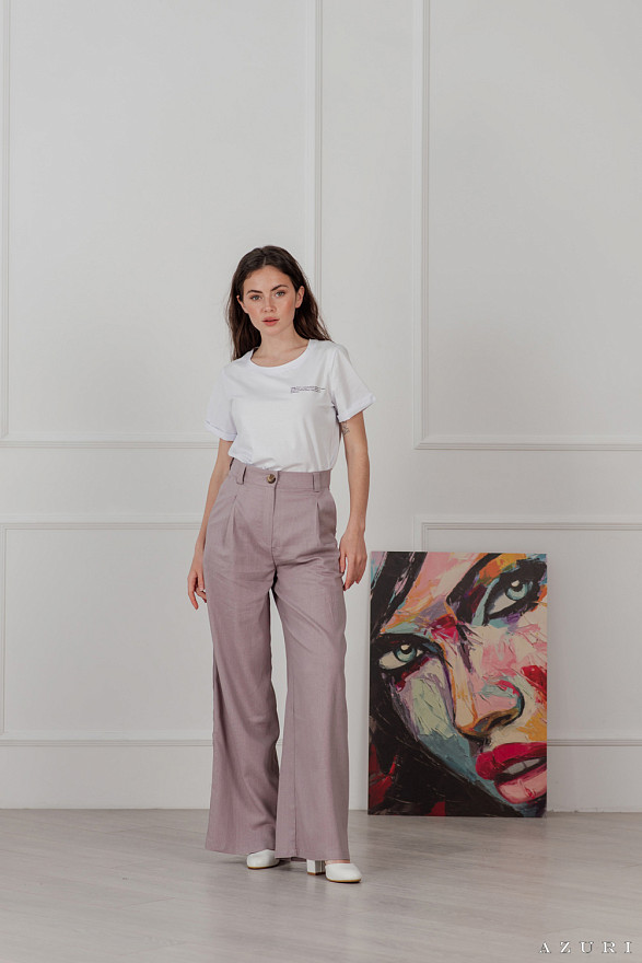 Лляні штани з широкими штанинами і защипами