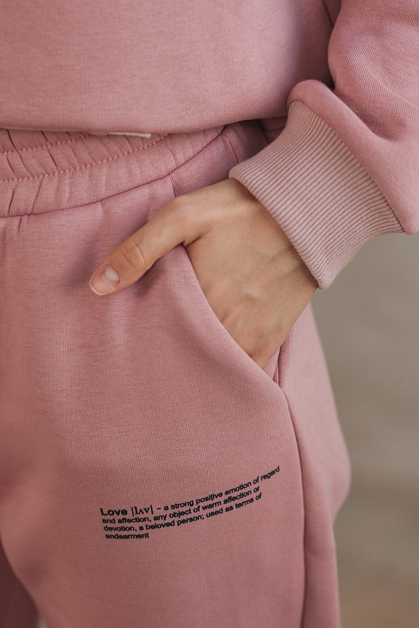 Пудрові спортивні штани з написом