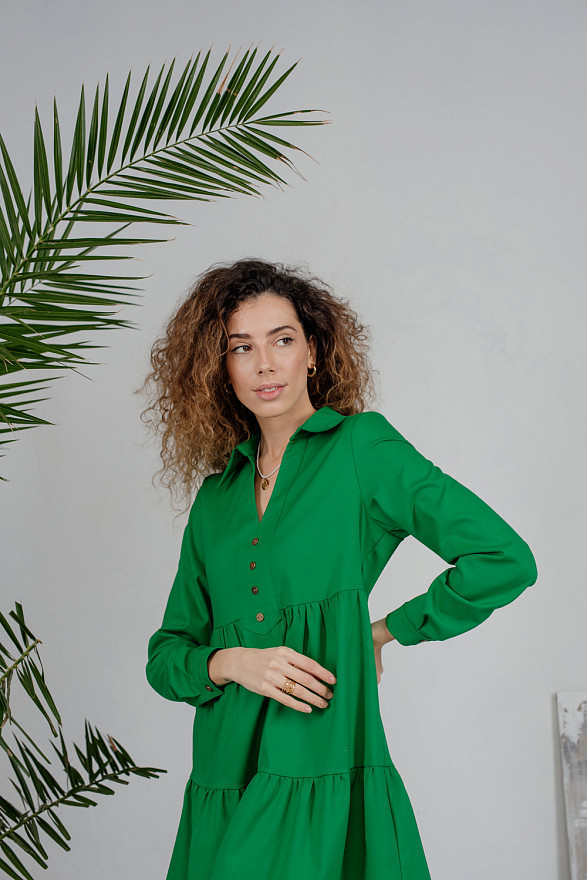 Зелена мінісукня з V-подібним вирізом