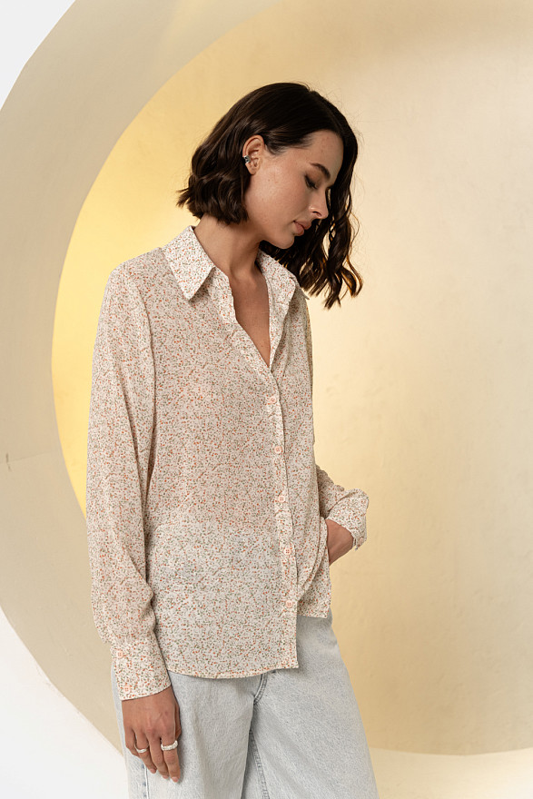 Кремова блуза вільного крою