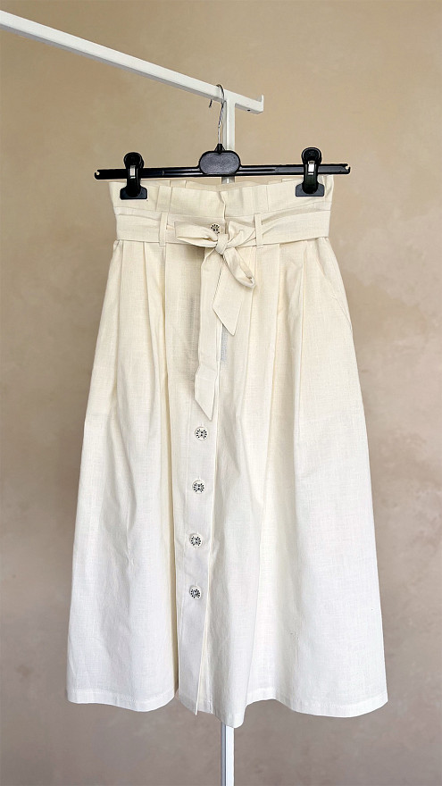 Молочная юбка из льна со складками