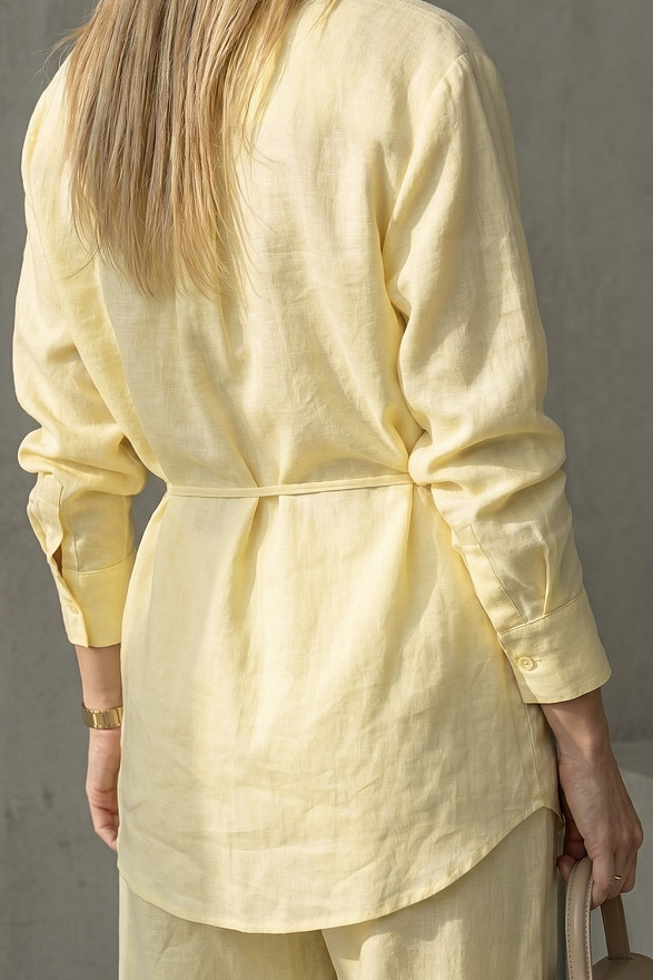 Yellow loose-fitting blouse with a belt
