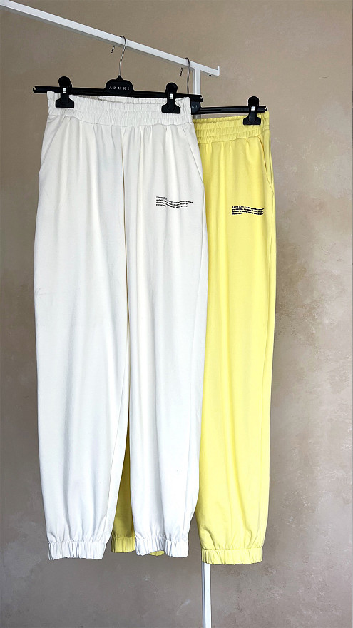 Молочні спортивні штани