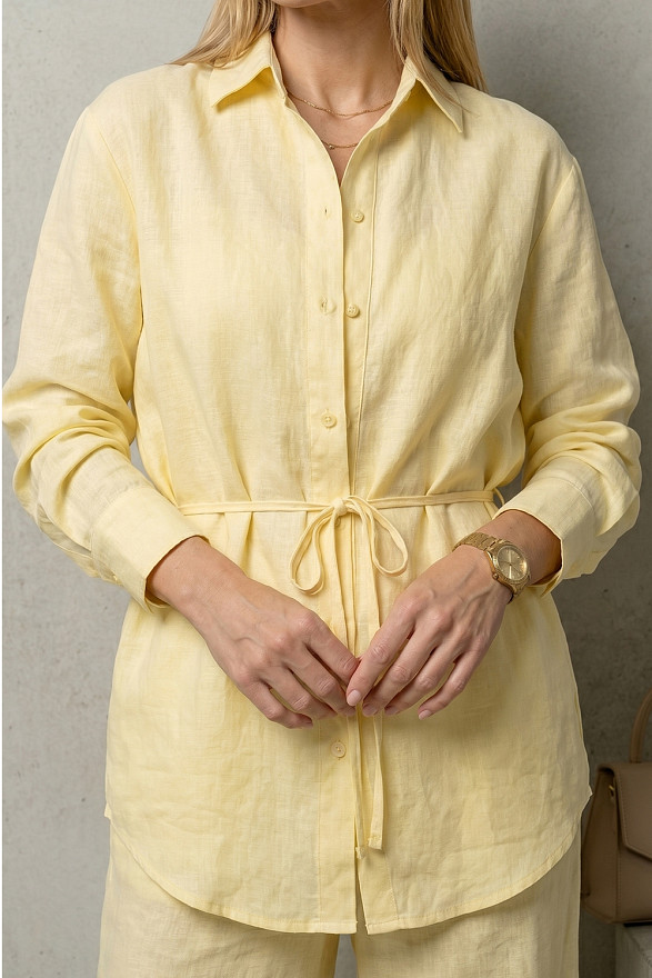 Yellow loose-fitting blouse with a belt