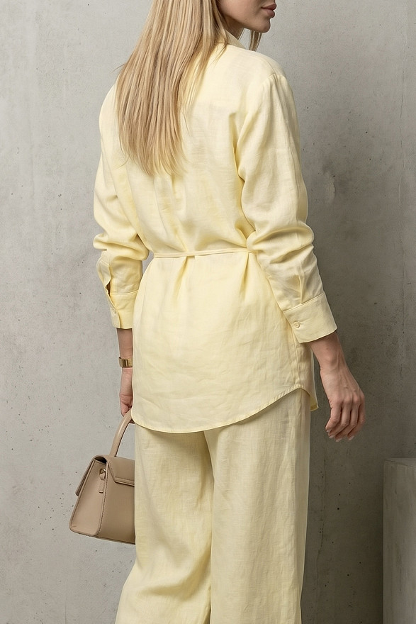 Yellow loose-fitting blouse with a belt