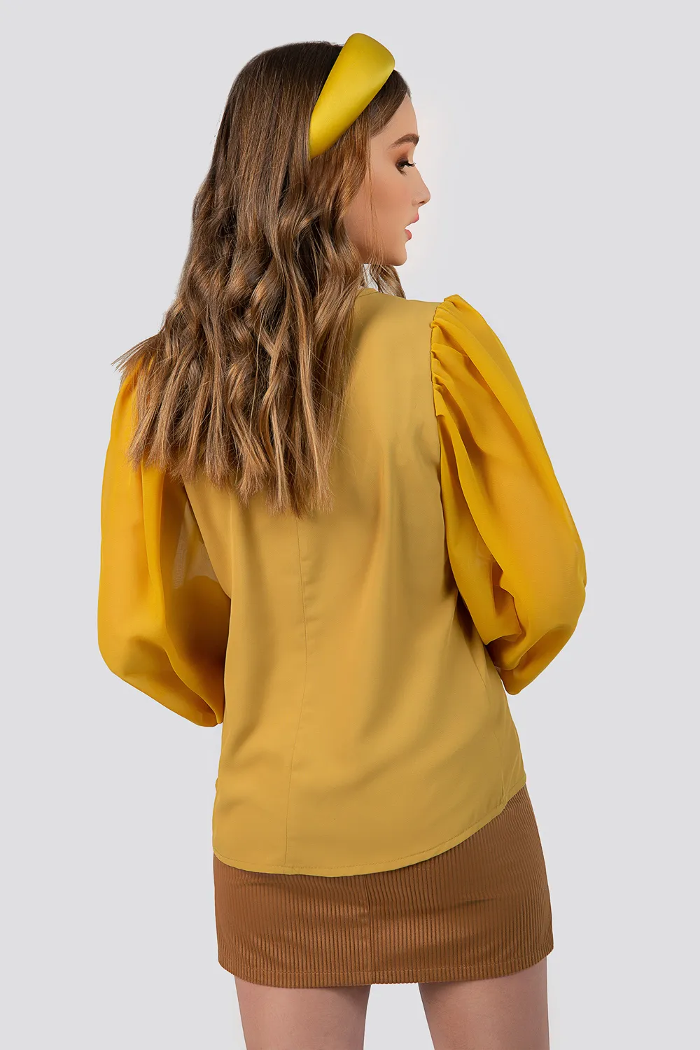 Блузка з баскою у 2026: Практичний посібник зі стилю без застарілих правил