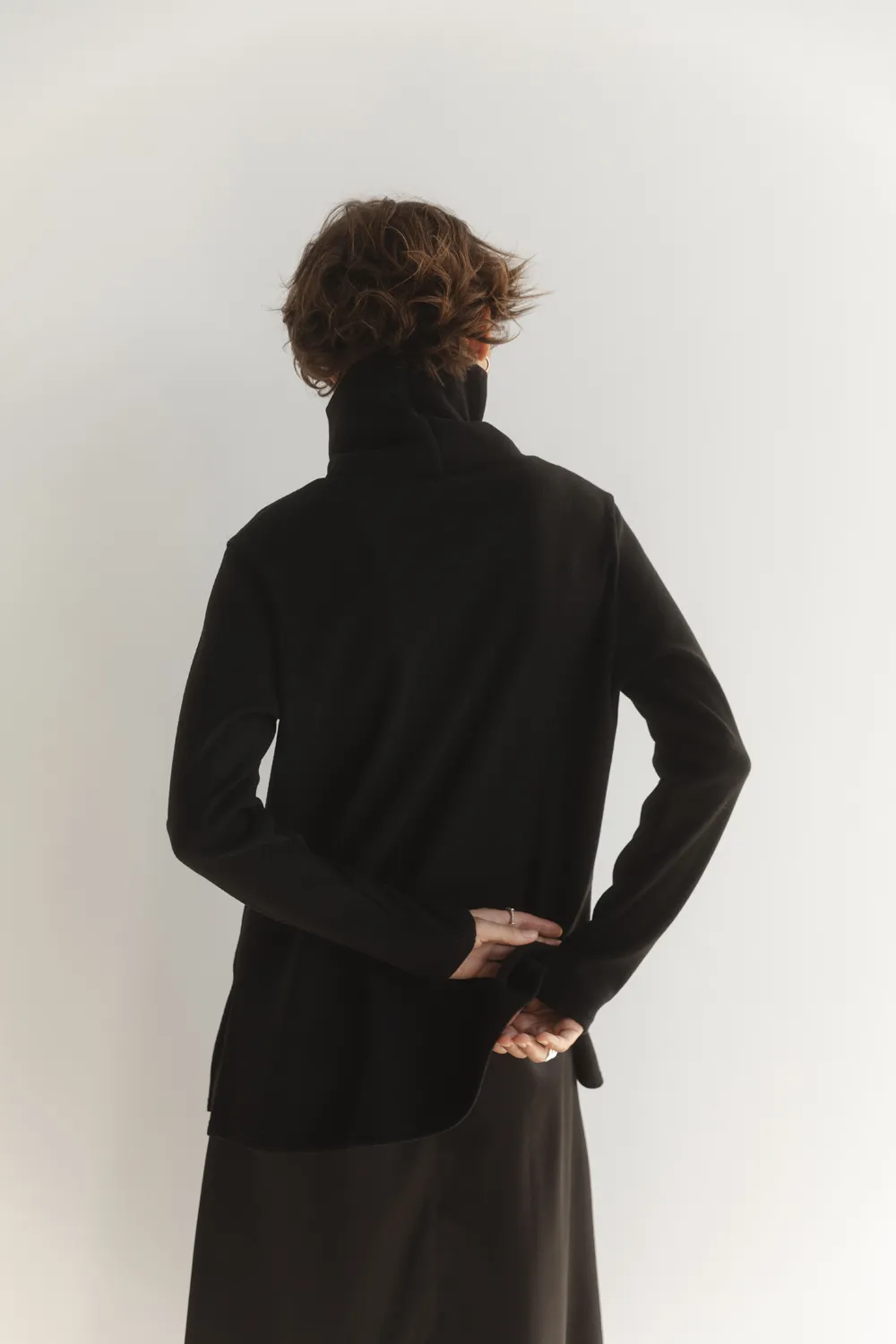 Black oversized knit sweater with side slits