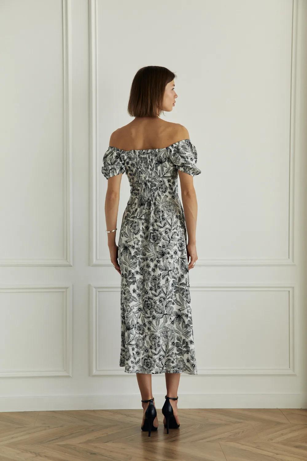 Black and white fitted midi dress