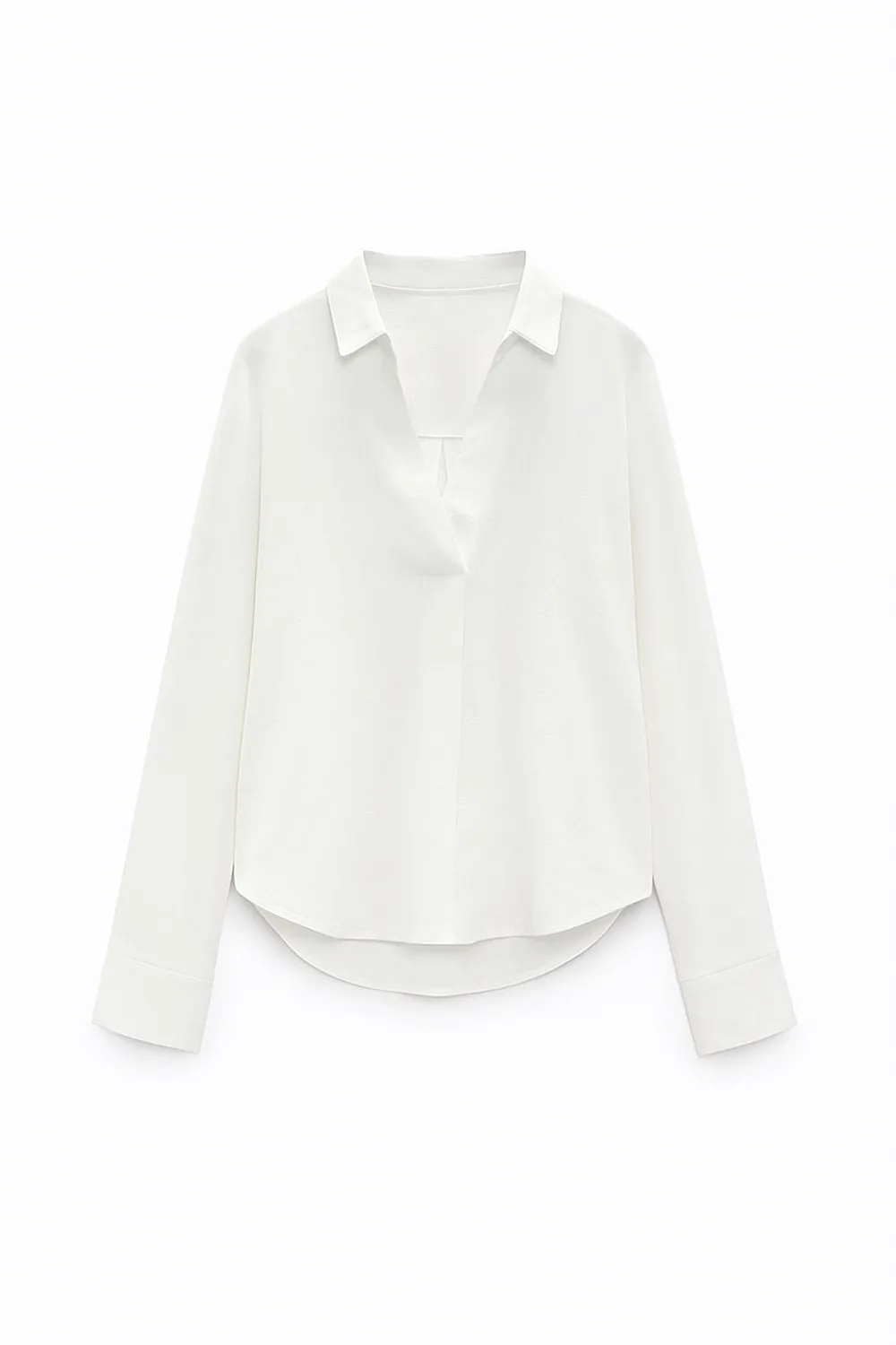 Біла легка блуза вільного крою