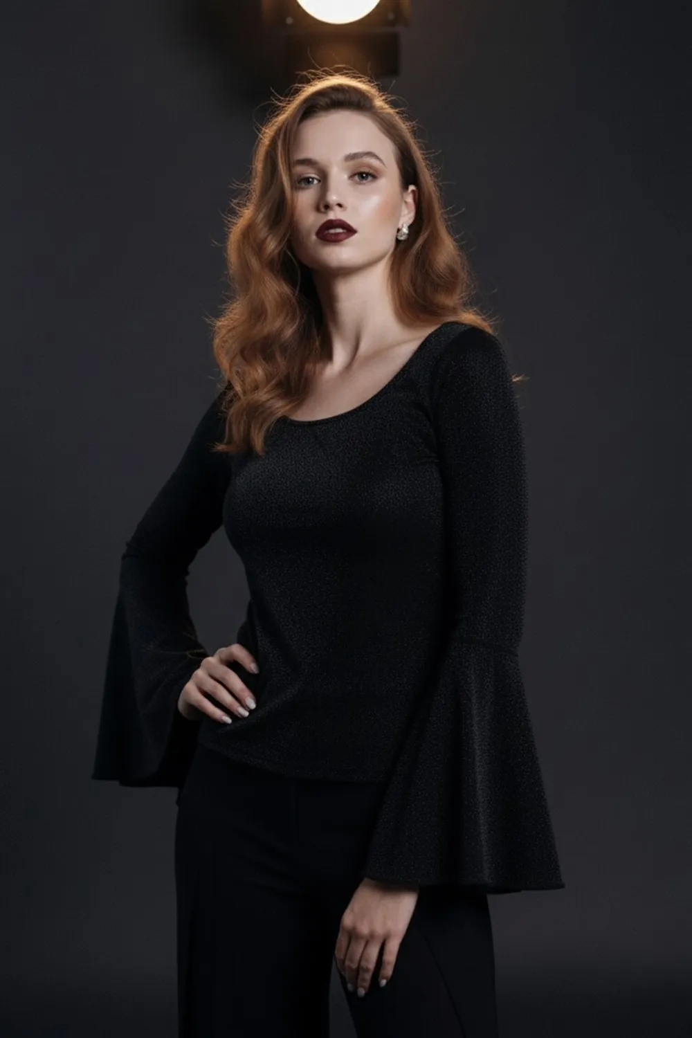 Чорний трикотажний топ із люрексу