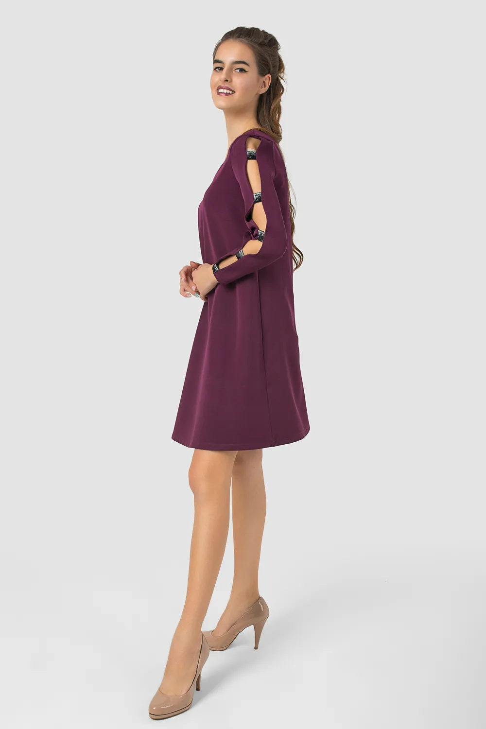 Dress with decorative inserts