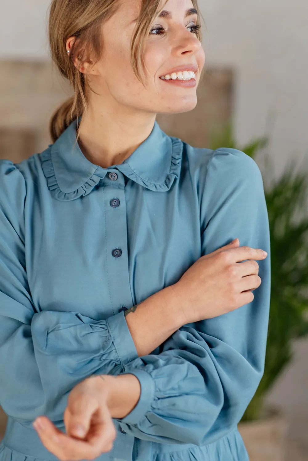 Blue dress with ruffles and collar
